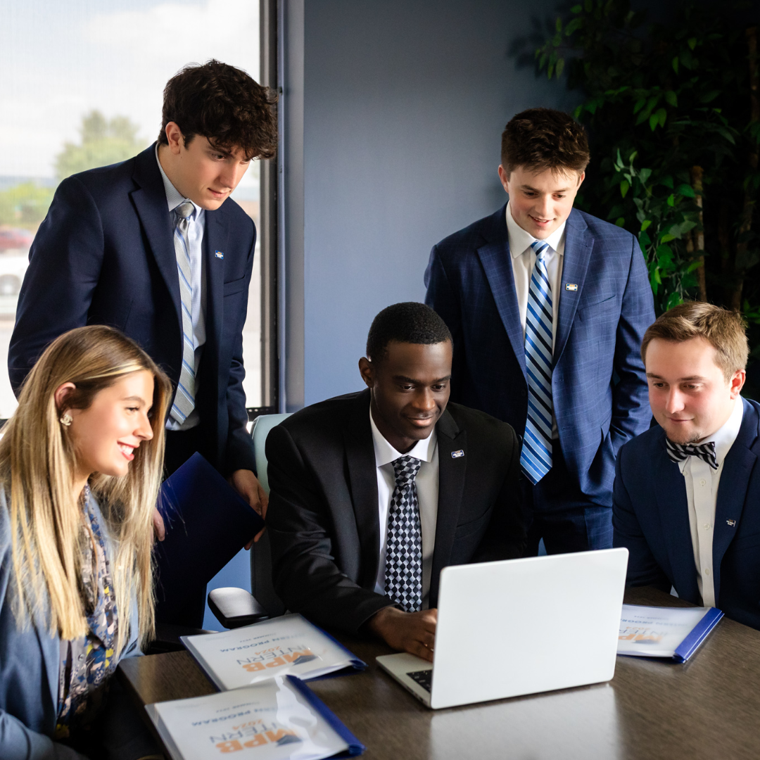 Mid Penn Bank employees collaborating to support education and workforce development initiatives.