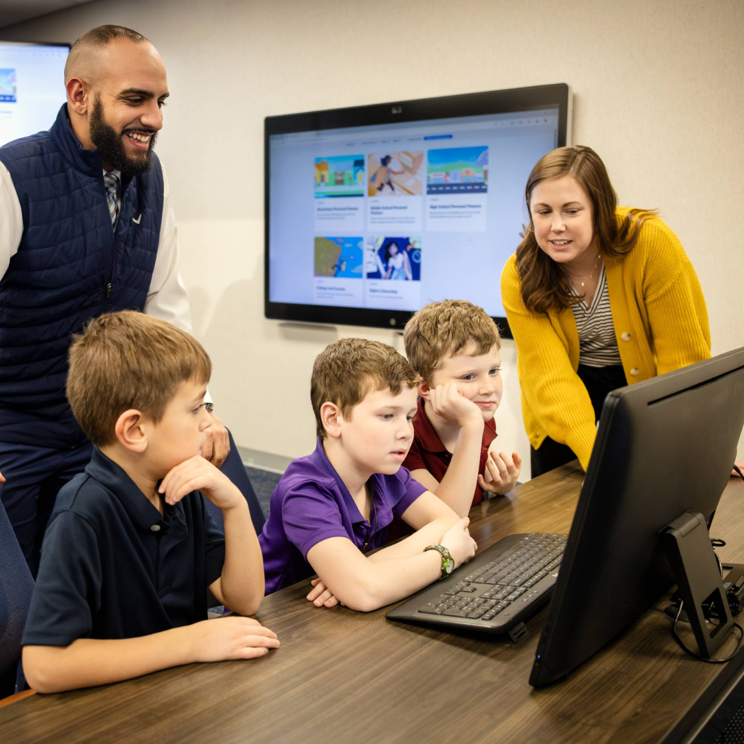 Mid Penn Bank employees leading a financial literacy lesson for students.