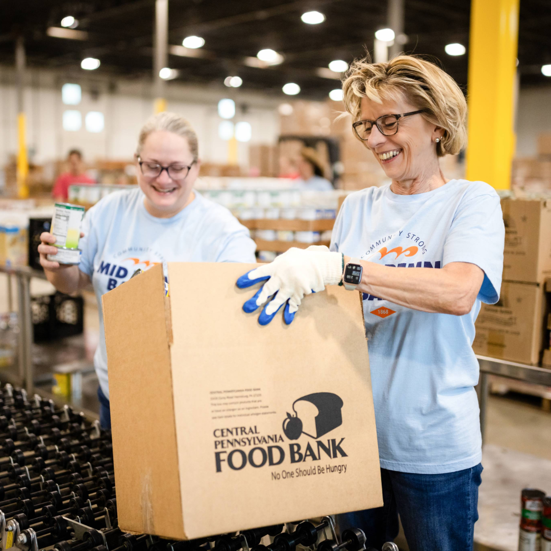 Mid Penn Bank employee supporting local food assistance efforts.
